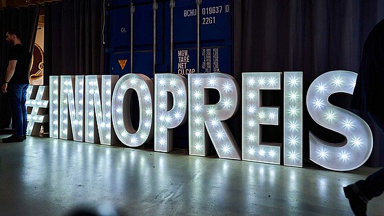 Berlin Brandenburg Innovation Award 2025, illuminated letters.