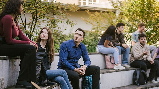 Students on the steps in the inner courtyard of HTW Berlin, Brain City Berlin